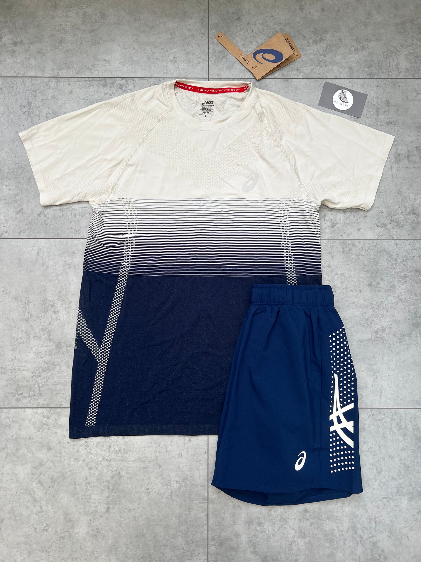 ASICS ‘Midnight Navy’ Seamless Short and T-shirt Set with gradient design, dot detail, and bold branding.