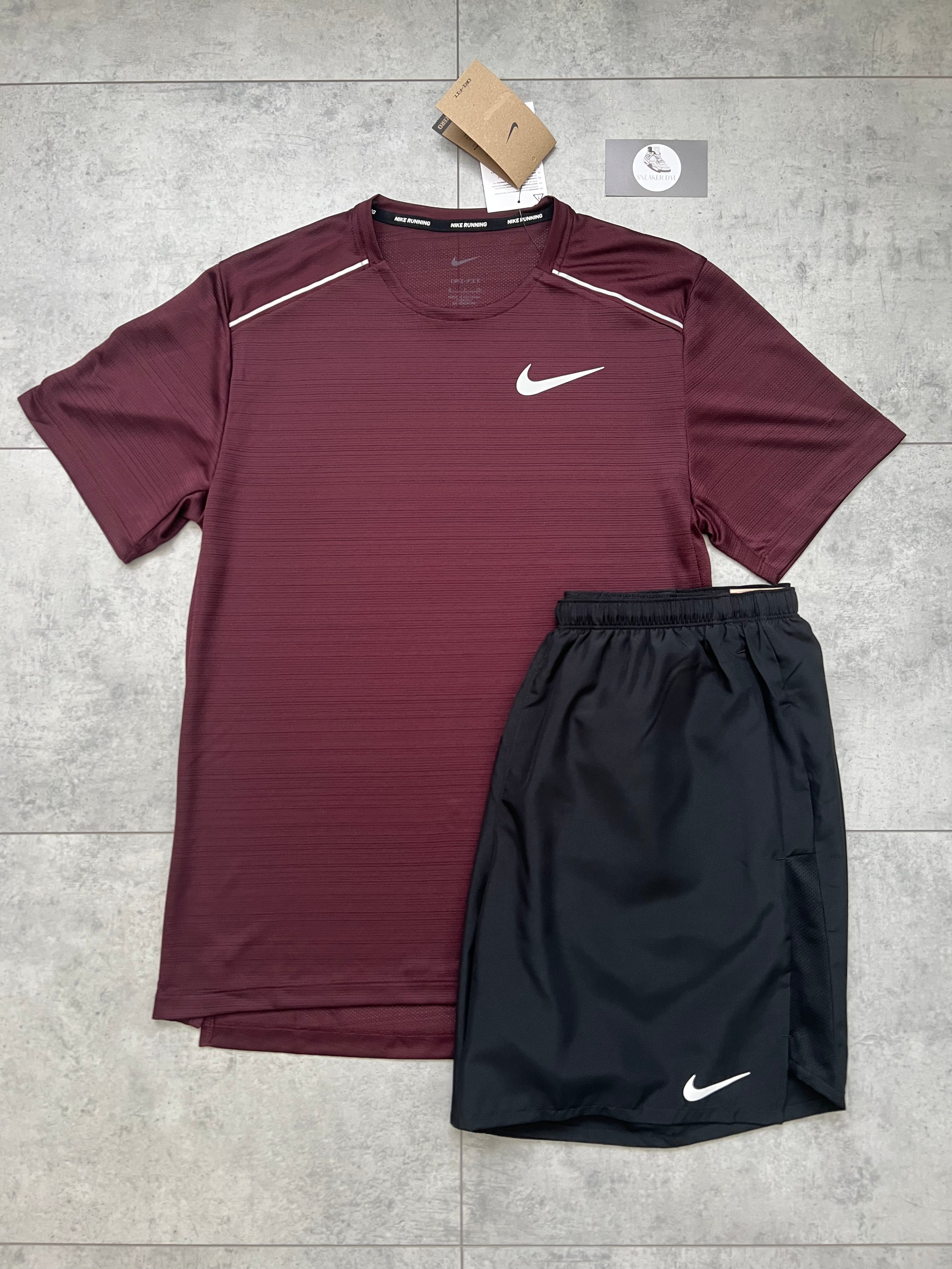 burgundy and black nike shirt